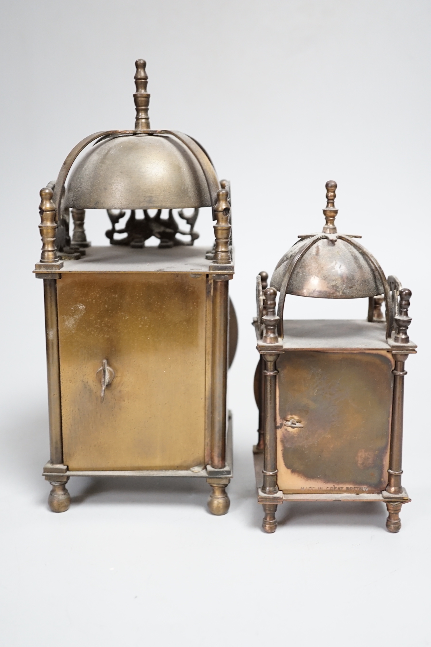 Two reproduction brass lantern clocks, tallest 24cm high
